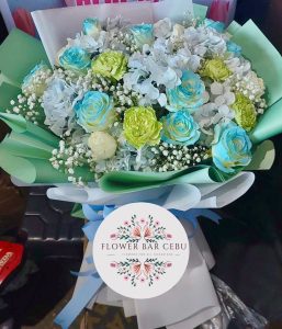 Ocean Breeze: Blue Rose & Mint Floral Arrangement